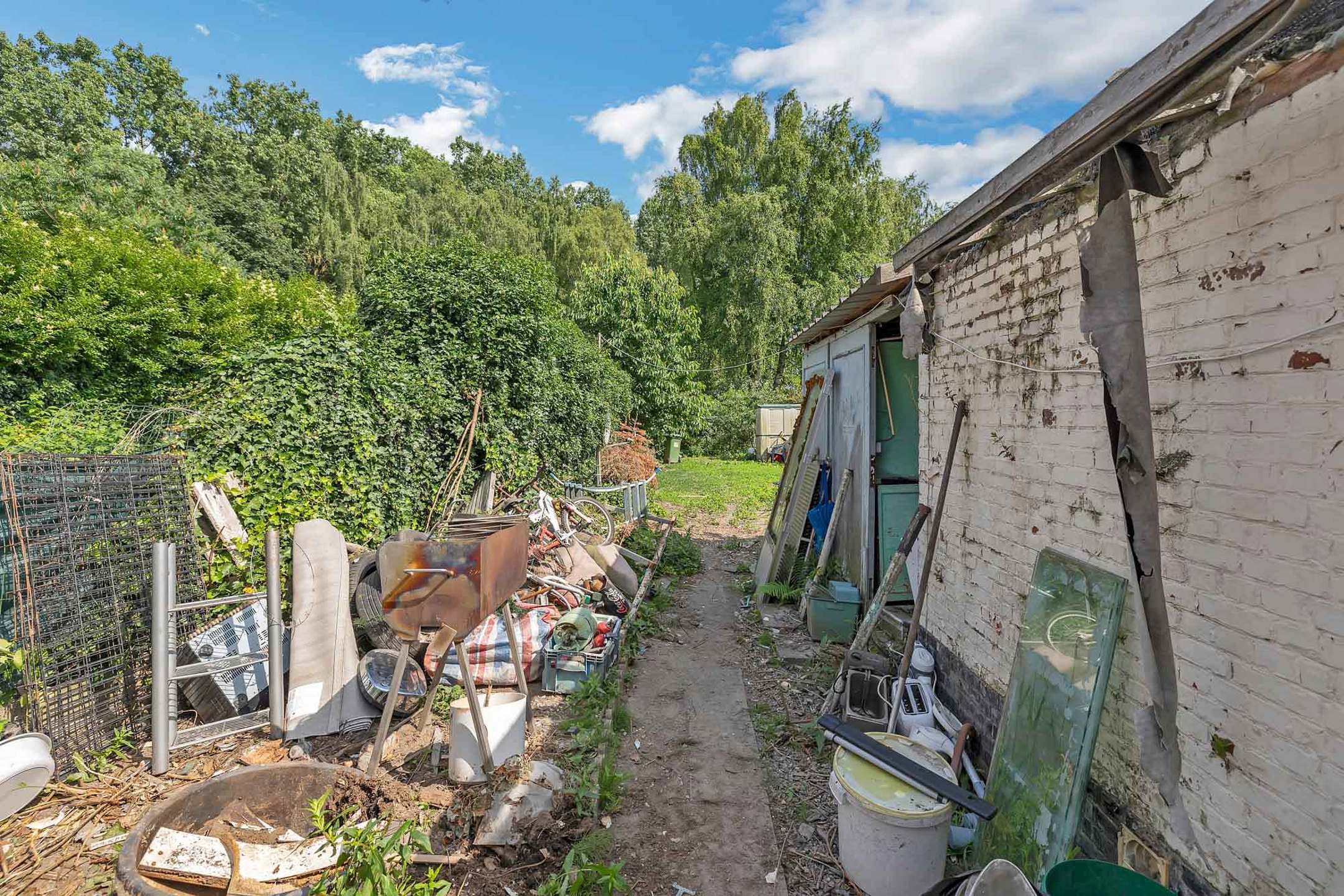 Te renoveren woning te koop in Lebbeke met garage foto 19