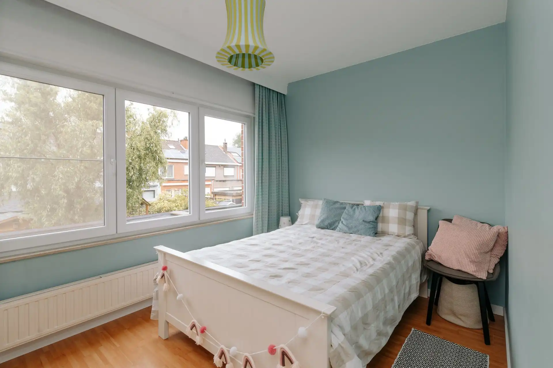 Gezinswoning met vier slaapkamers + tuin en garage foto 14