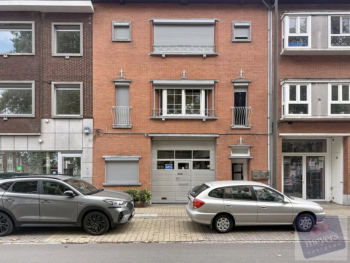 Veelzijdig handelspand met ruim gelijkvloers appartement en tuin in Hasselt foto 2