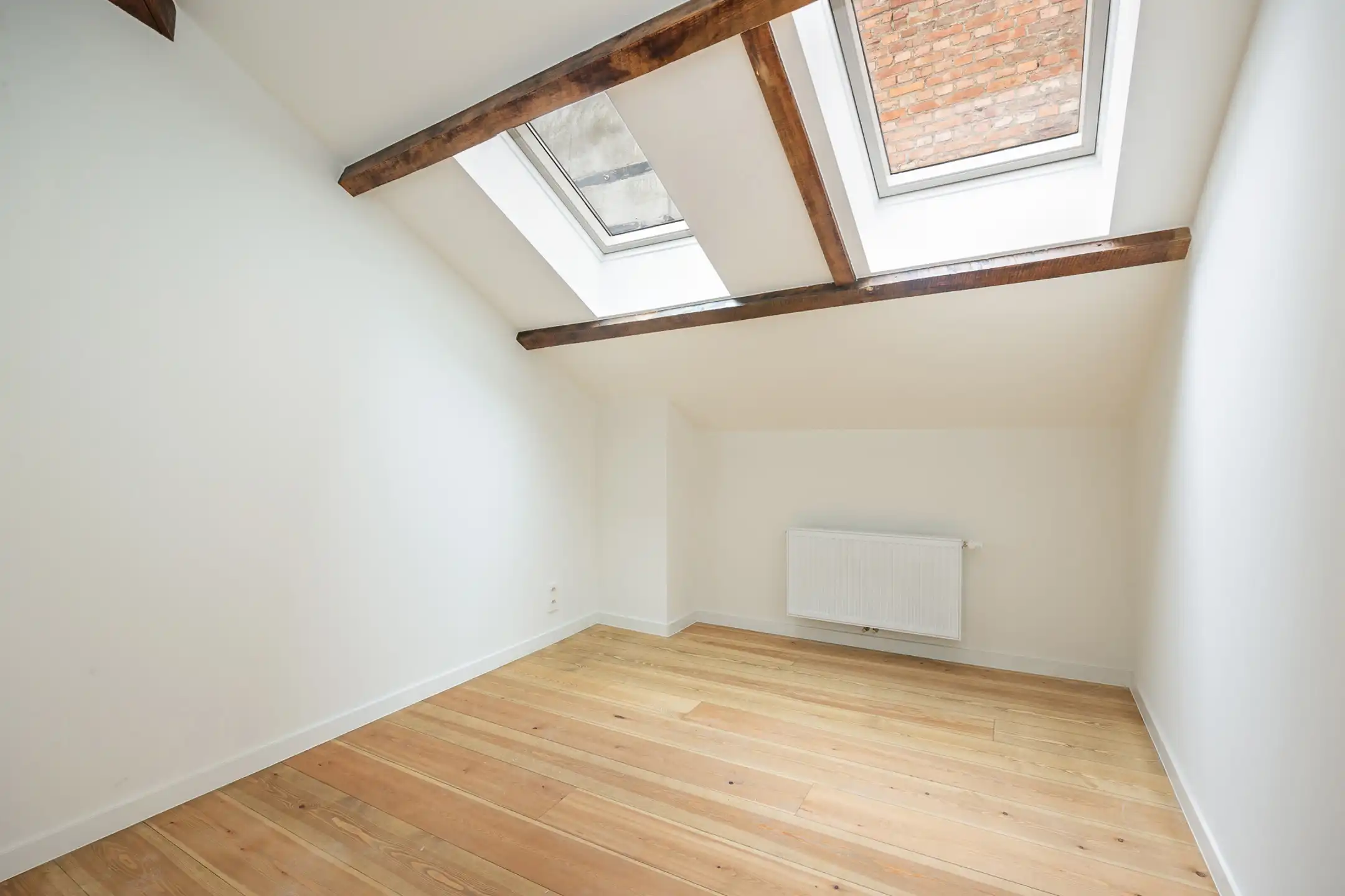 High-end duplex in hart van Antwerpen met iconisch uitzicht foto 12