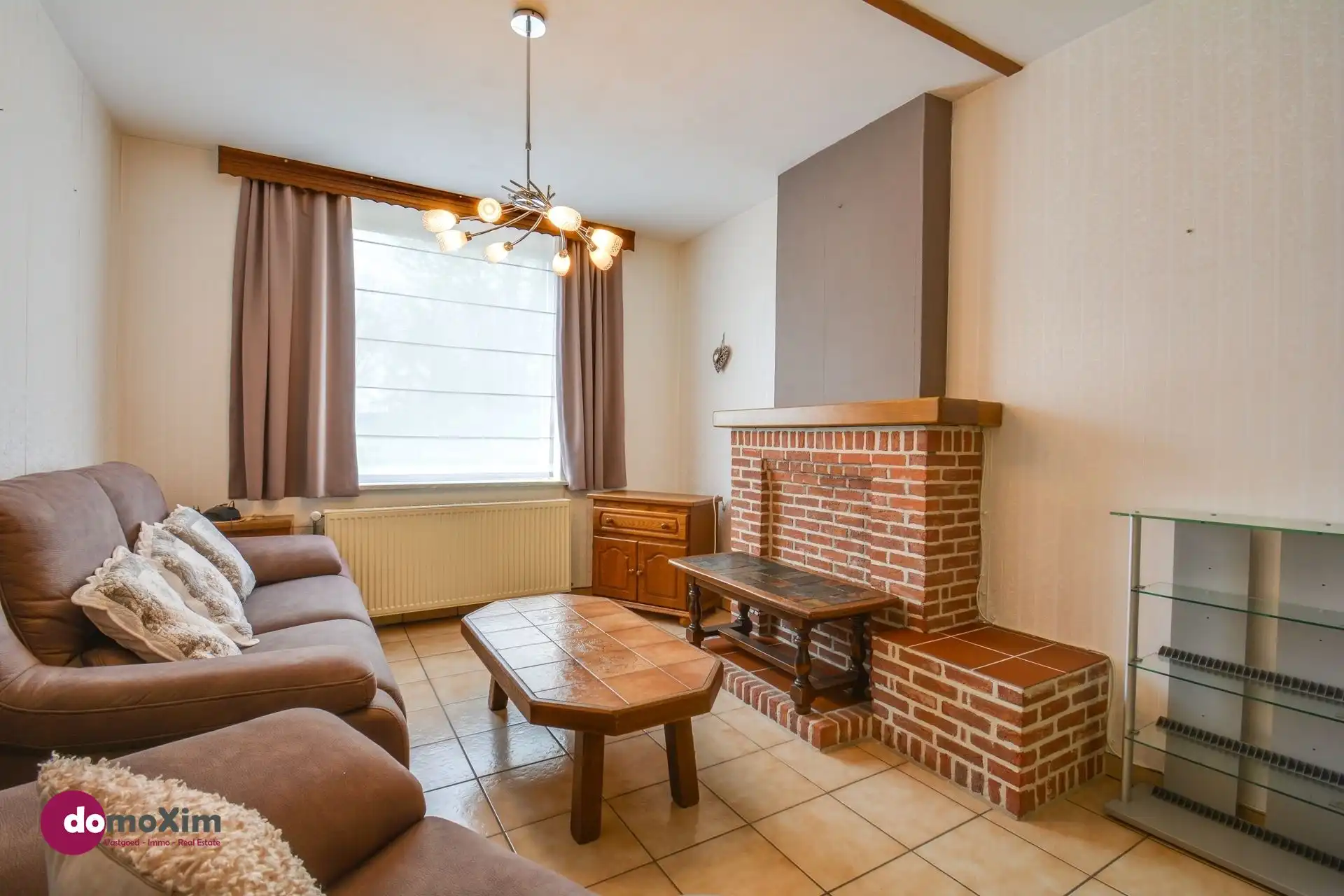 Te renoveren woning op bereikbare locatie in Boortmeerbeek foto 2