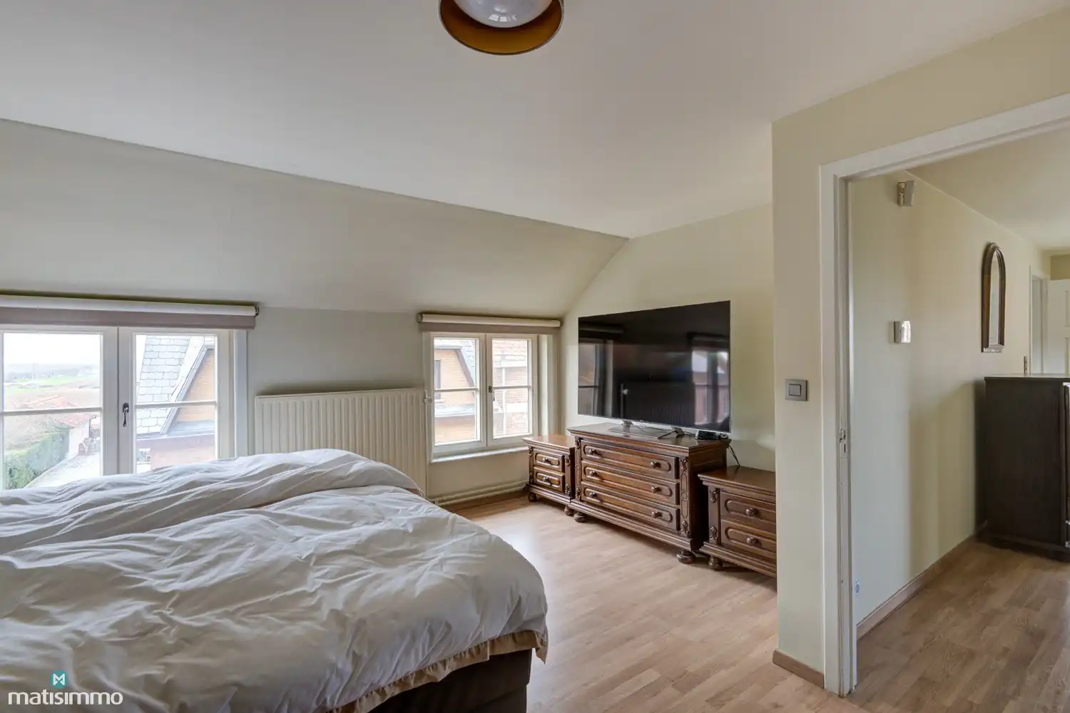 INSTAPKLARE EN ENERGIEZUINIGE WONING MET INPANDIGE GARAGE, TUINKAMER, KELDER EN RUIME TUIN TE ELST foto 20