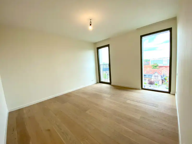 Instapklaar recent appartement met 2 slaapkamers foto 14