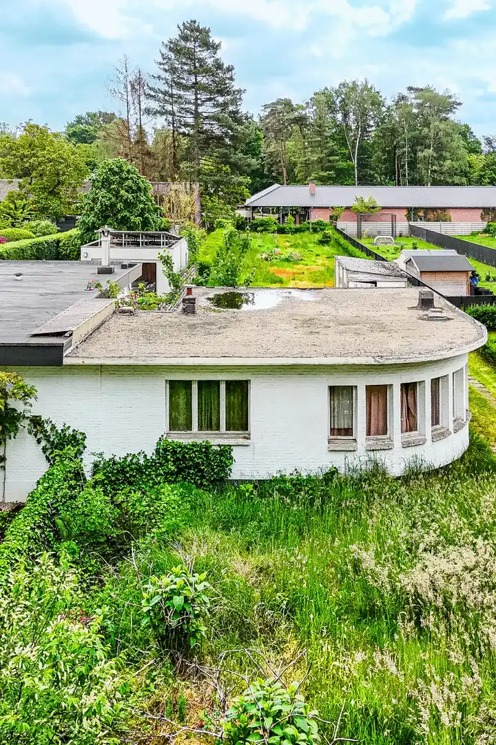 Unieke bouwgrond met vergunde renovatie of nieuwbouwmogelijkheid foto 4
