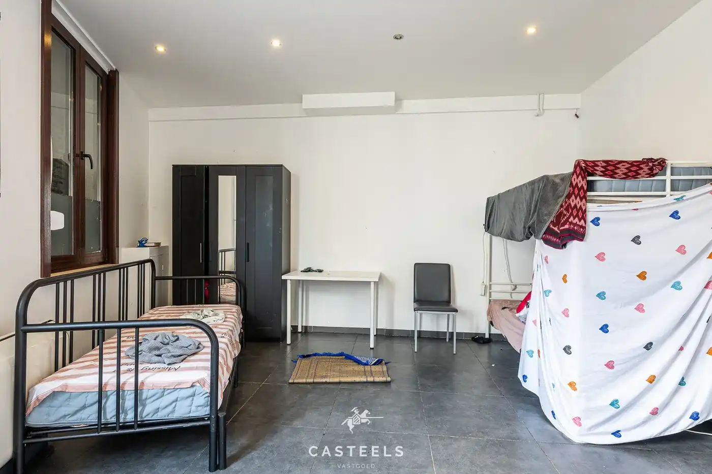 Instapklare opbrengsteigendom met handelsruimte en woonst op toplocatie in Ledeberg foto 11