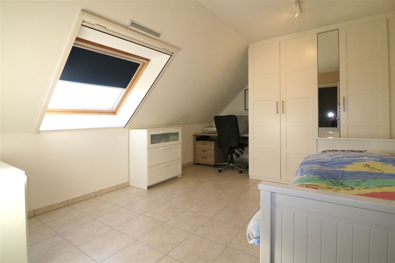 Centraal, doch rustig gelegen duplex met 2 slpk. en afgesloten garage foto 25