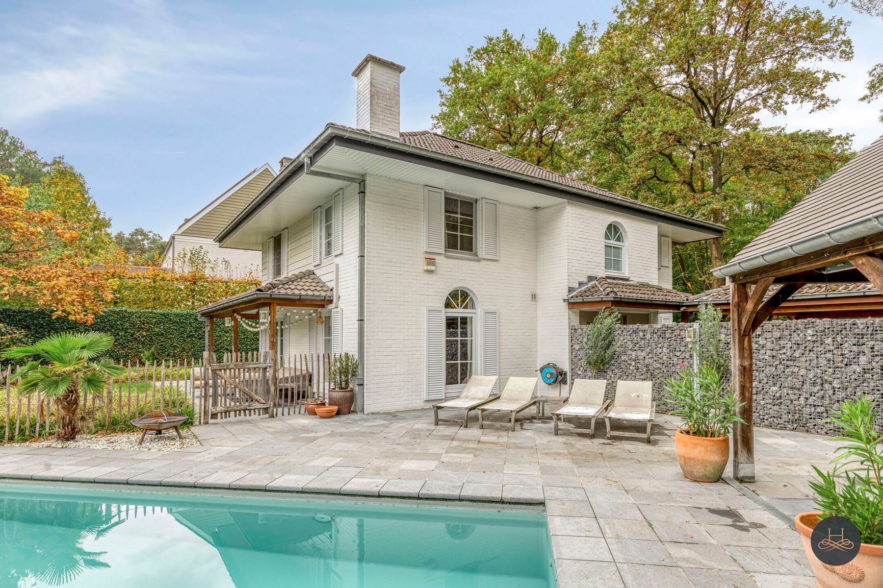 Indrukwekkende groen gelegen villa met zwembad en poolhouse  foto 42