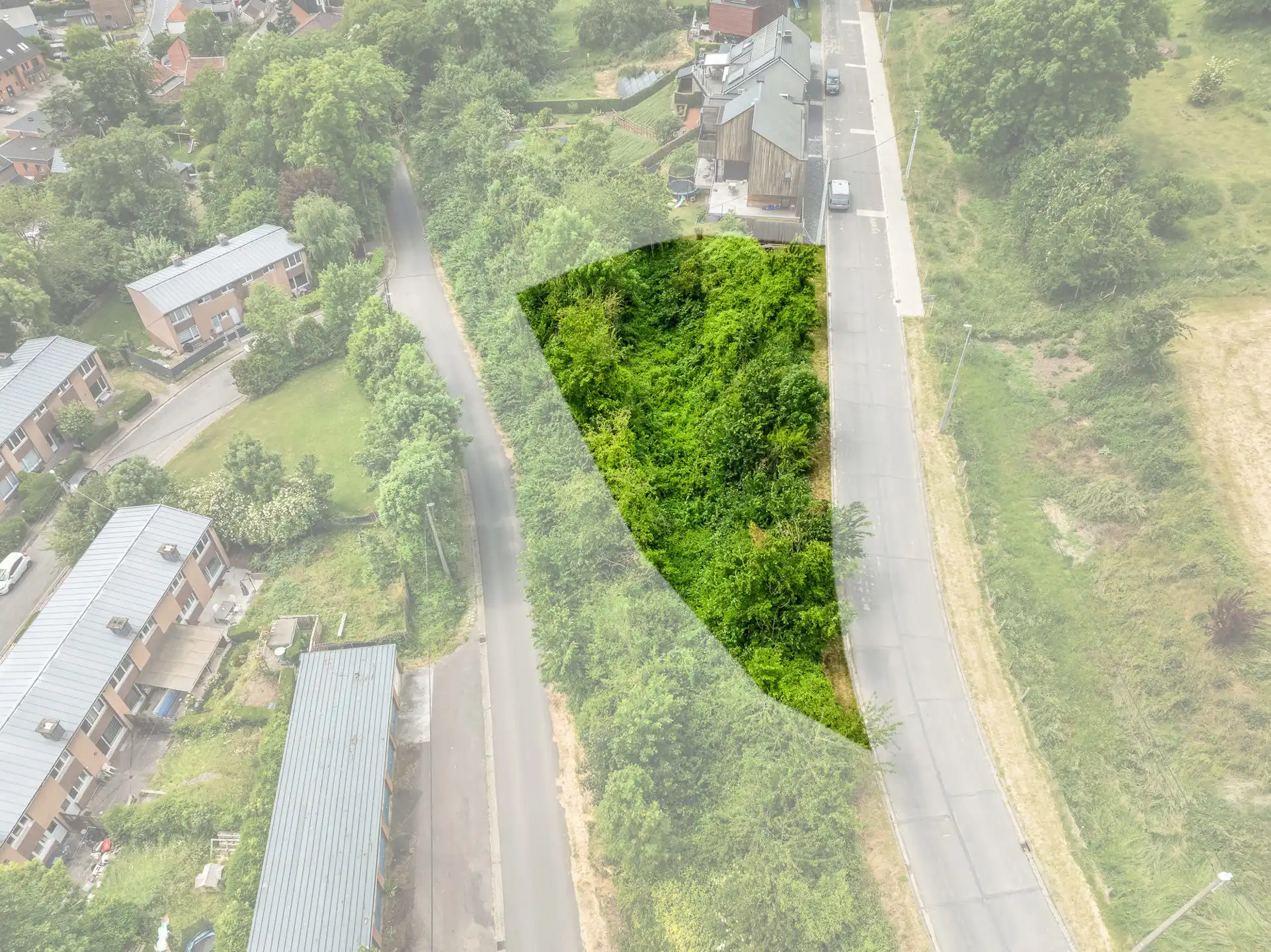 Vrijstaande bouwgrond met verzicht en vergunning foto 12