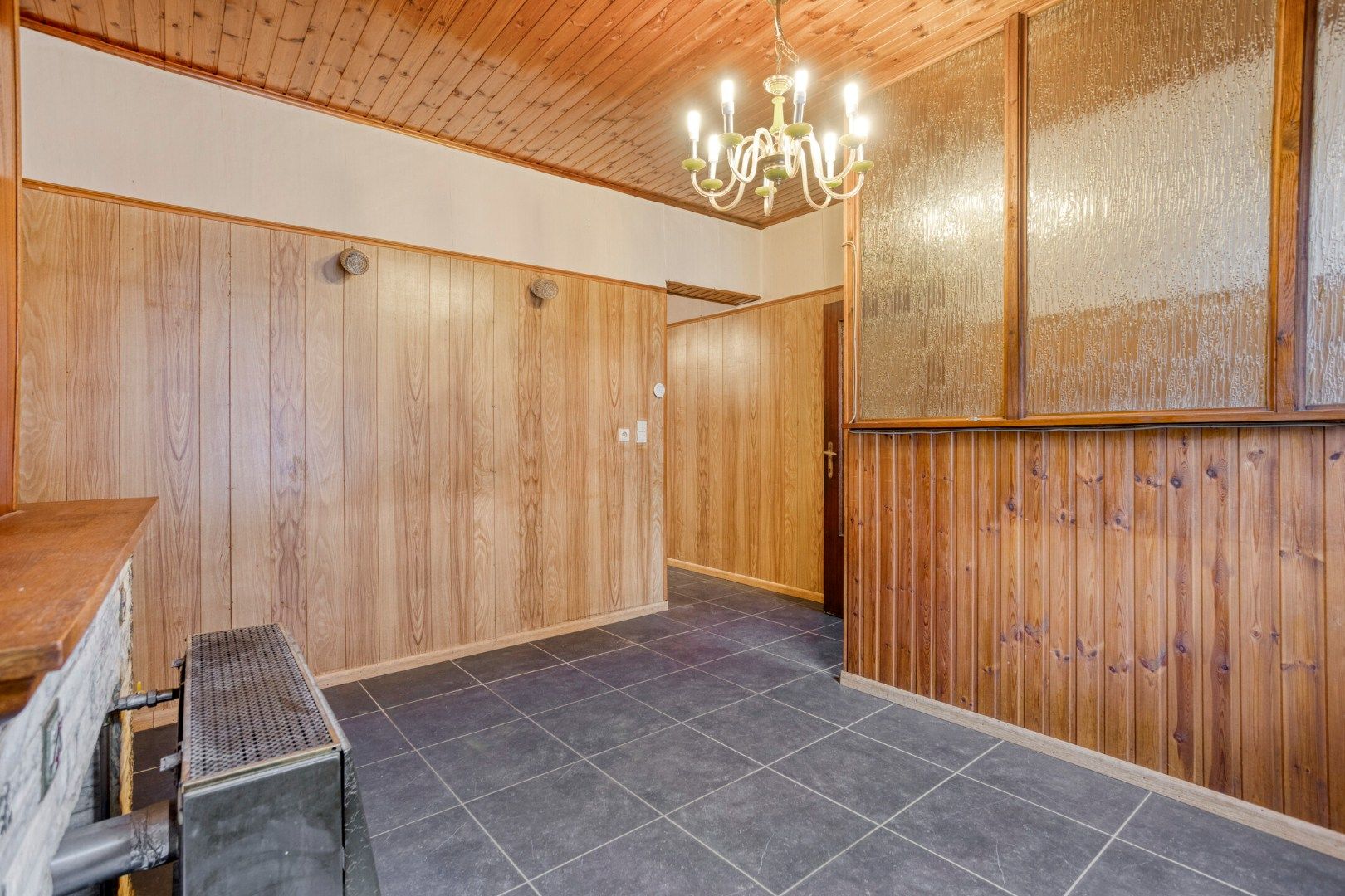 Goedgelegen rijwoning foto 3