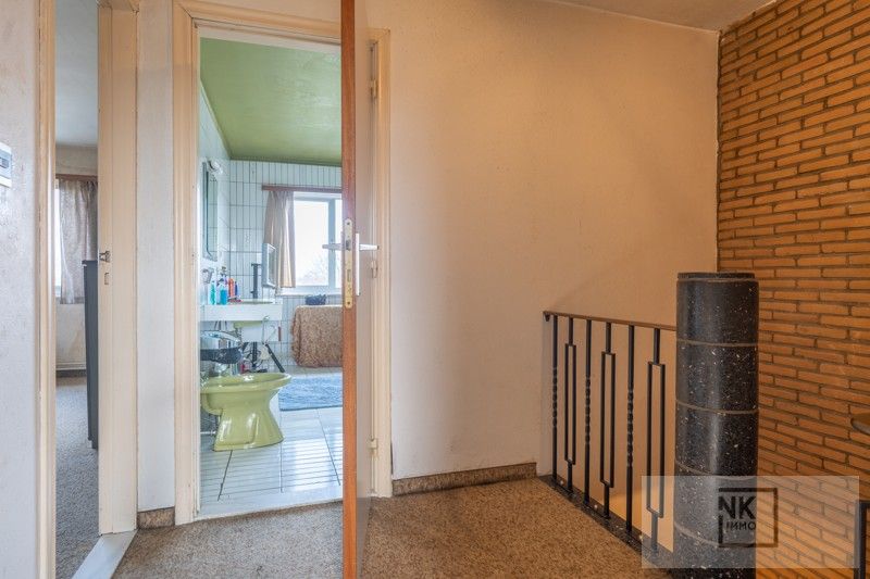 Ruime bel-etage woning met grote grond op een aangename ligging in Arendonk foto 30