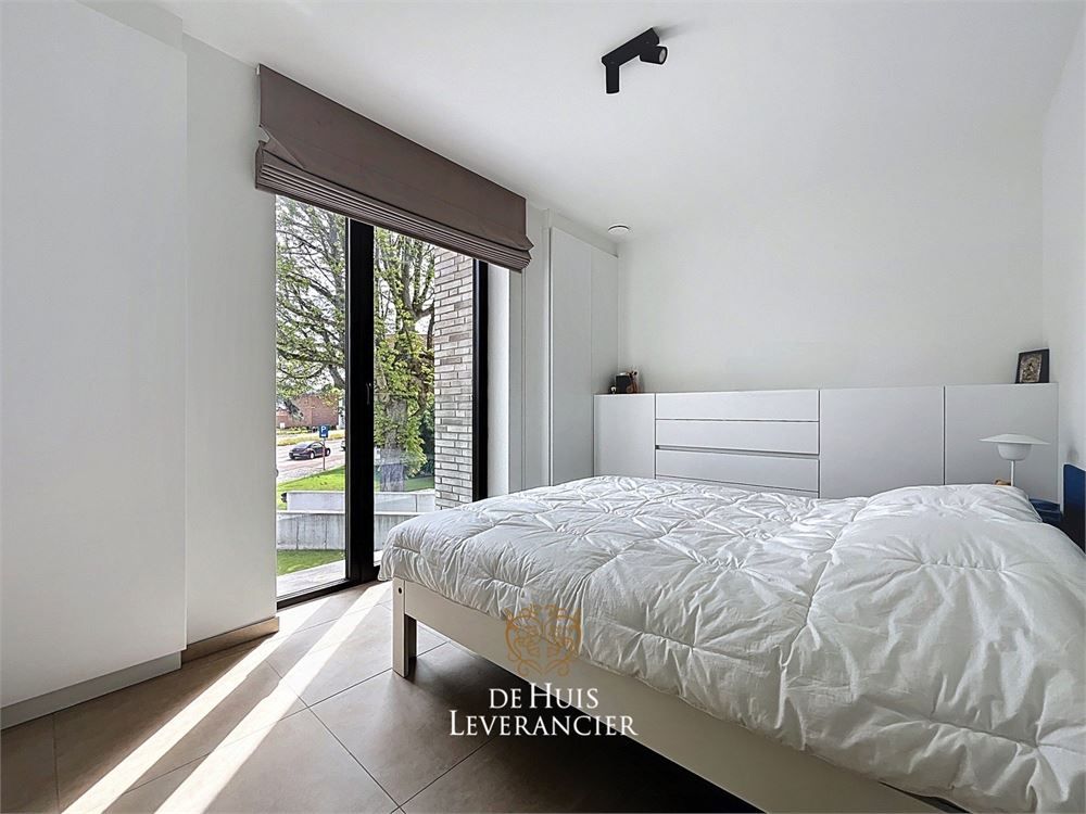 Discrete luxe & tijdloze elegantie : subliem nieuwbouwappartement met terras en gemeenschappelijk tuin te koop in Boechout foto 32