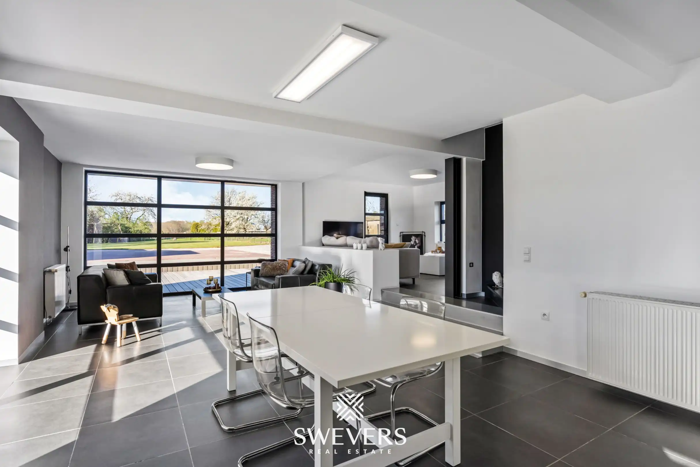 Instapklare open bebouwing met ruime tuin en prachtig uitzicht tussen de boomgaarden in Gingelom foto 9