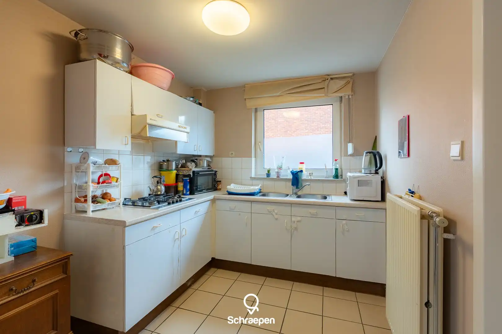 Lichtrijk gelijkvloers appartement met garagebox en privétuintje nabij Zonhoven-centrum! foto 8