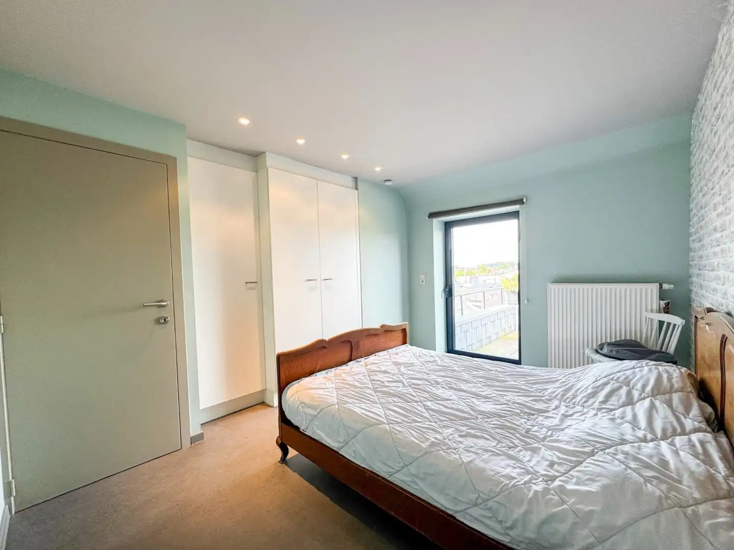 Zeer ruim duplexappartement met 2 slaapkamers en grote zolder foto 11
