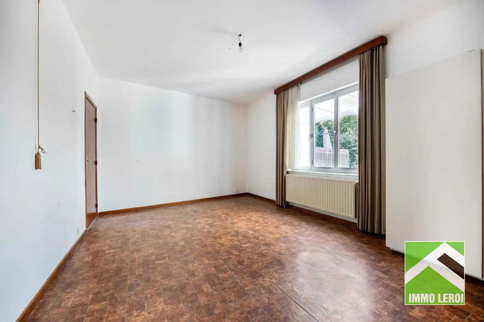 Zeer ruim gelijkvloers appartement met groot terras en tuin - centrum Tongeren foto 12