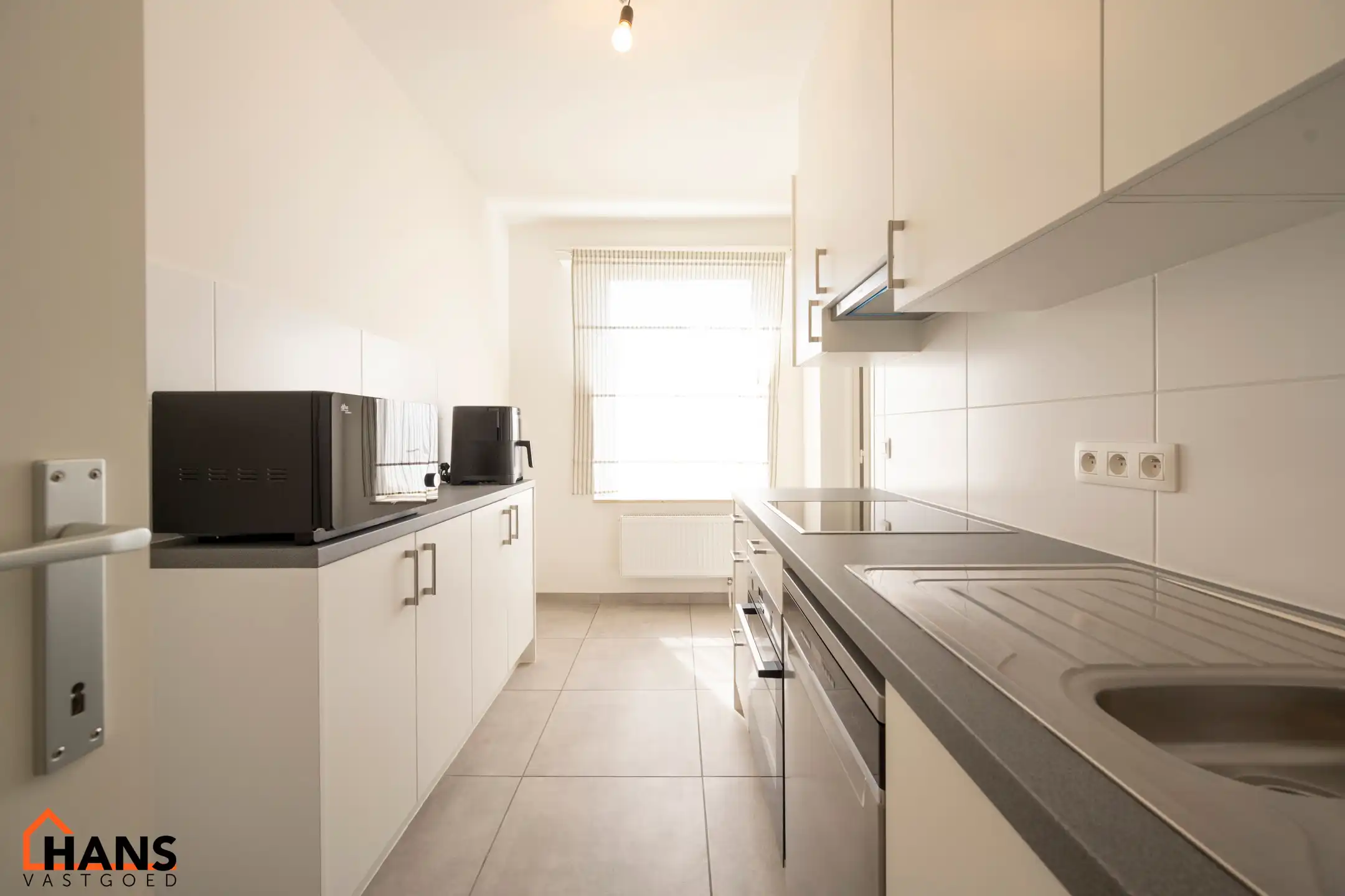 Appartement op de 2de verdieping met garage. foto 4