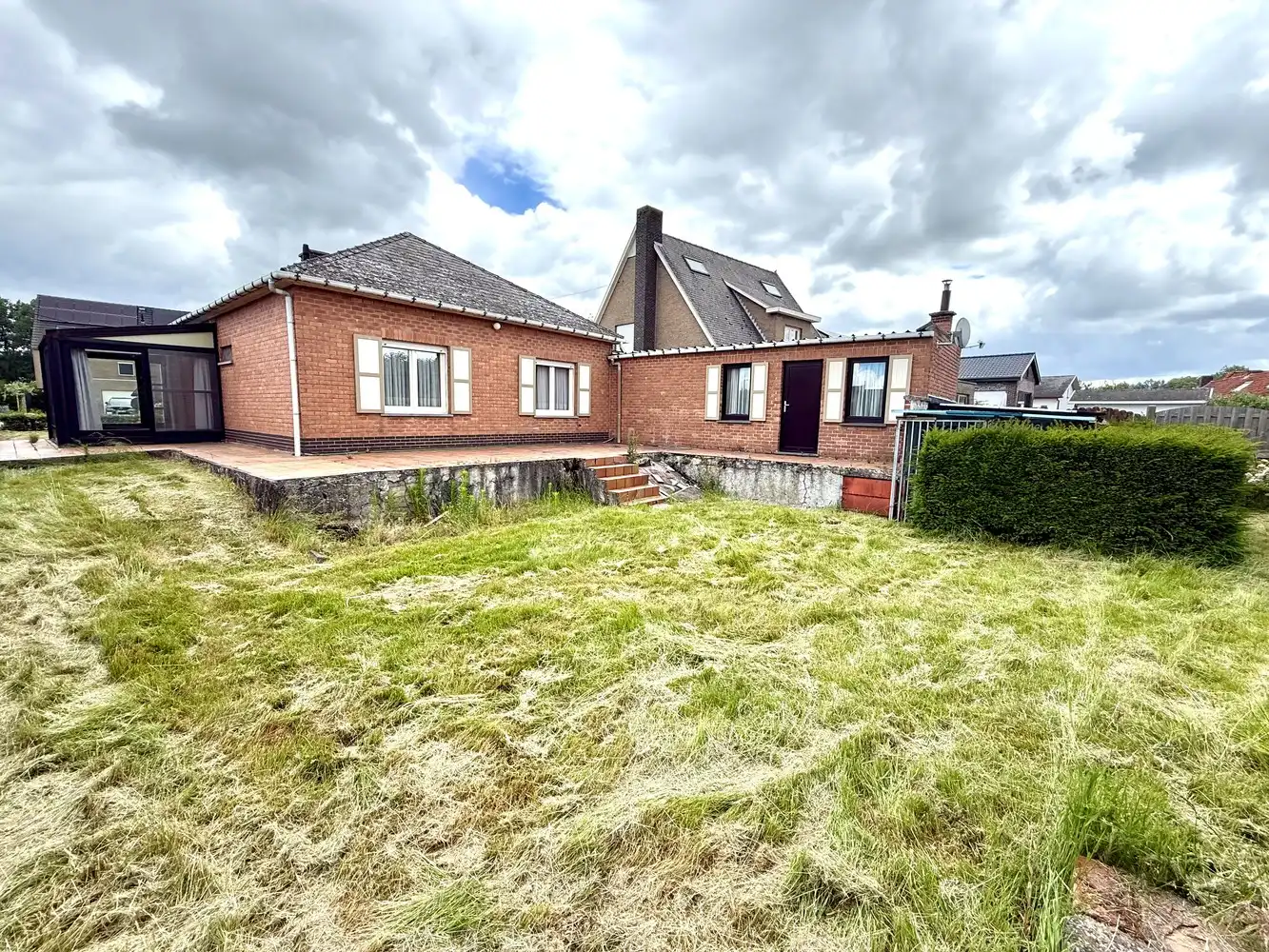 Centraal gelegen woning met veel potentieel op mooi perceel! foto 14