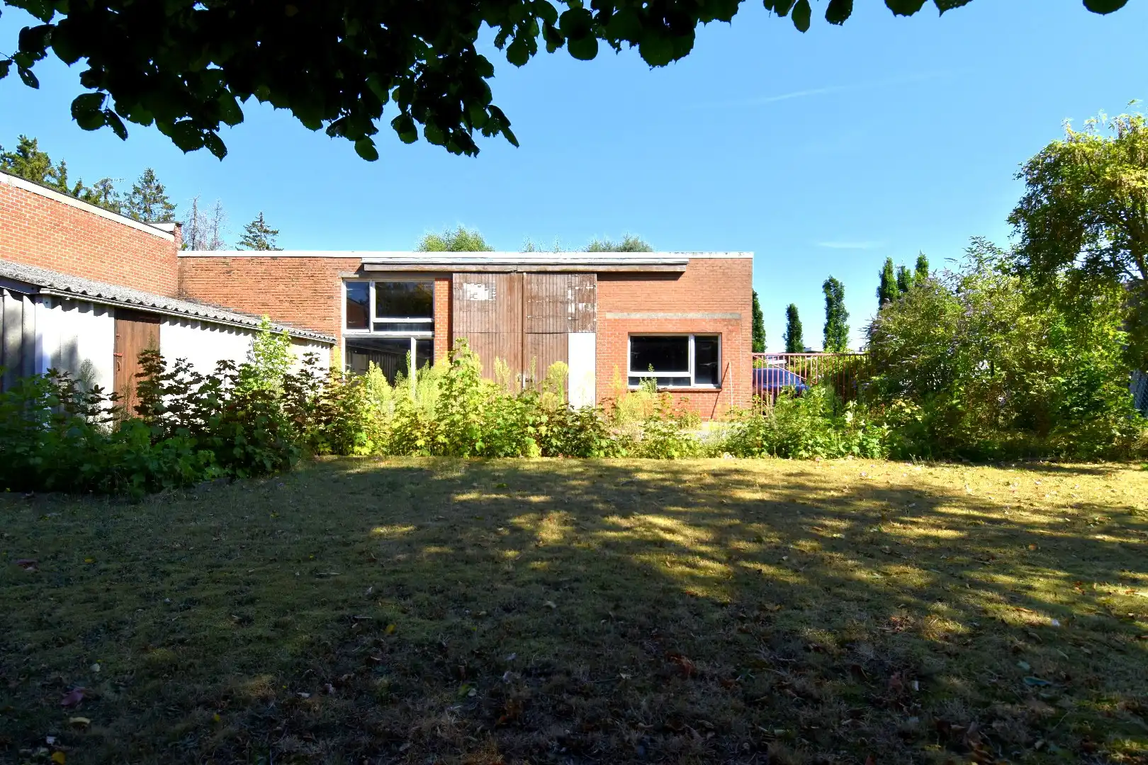 Alleenstaande woning met achterliggende opslag ruimte (205 m²) te koop in Heule foto 15
