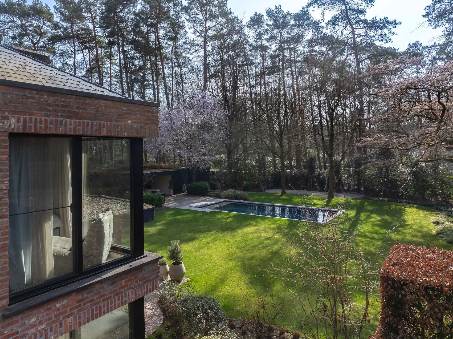 Architectenvilla met zwembad en ZW tuin in Hof Ter Linden foto 56