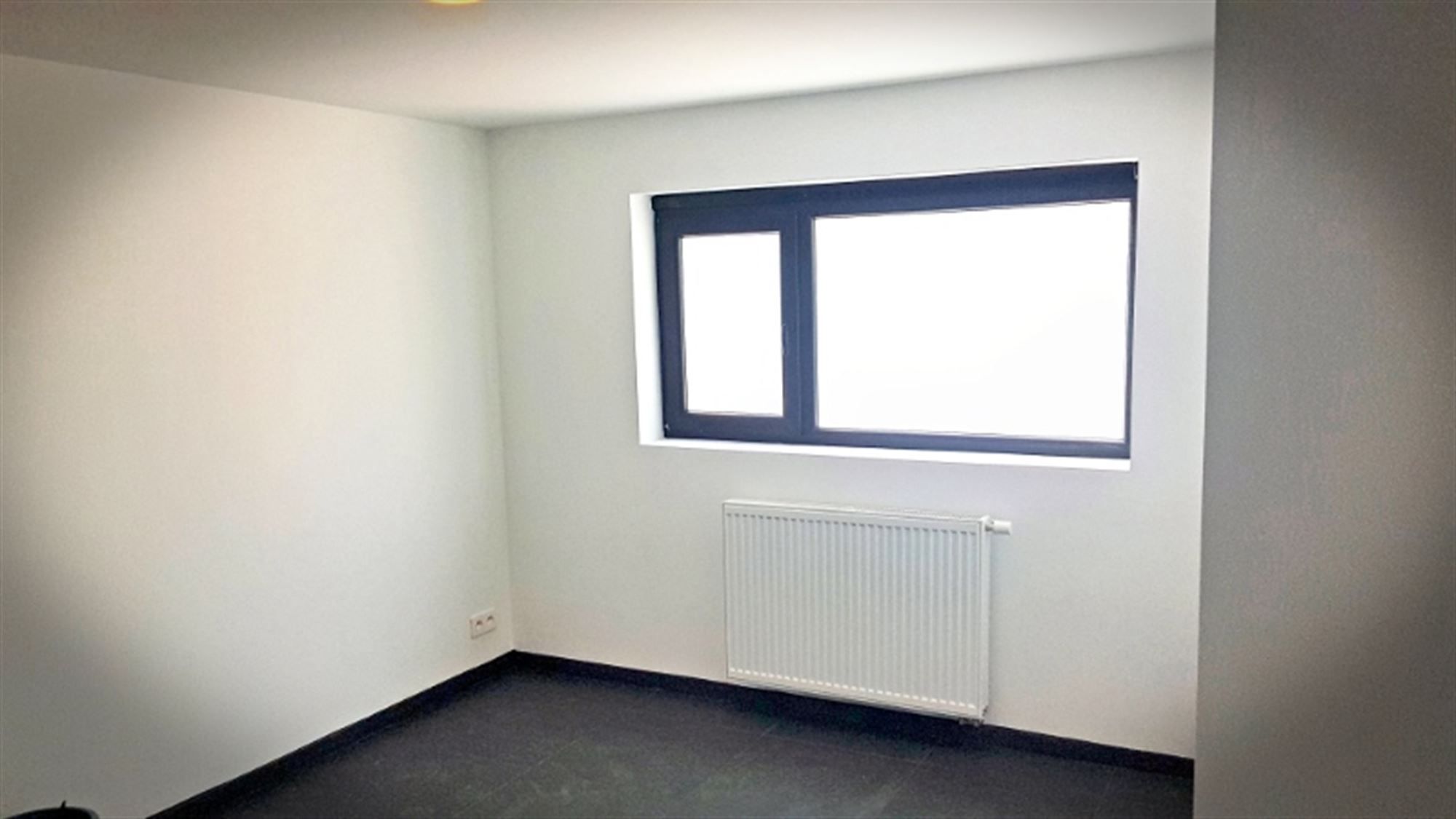 Prachtig gerenoveerd gelijkvloers appartement met 2 slaapkamers foto 14