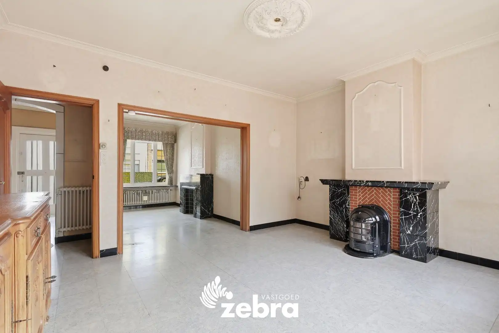 Woning met veel potentieel, 3 slaapkamers en ruime zolder in hartje Tielt! foto 2