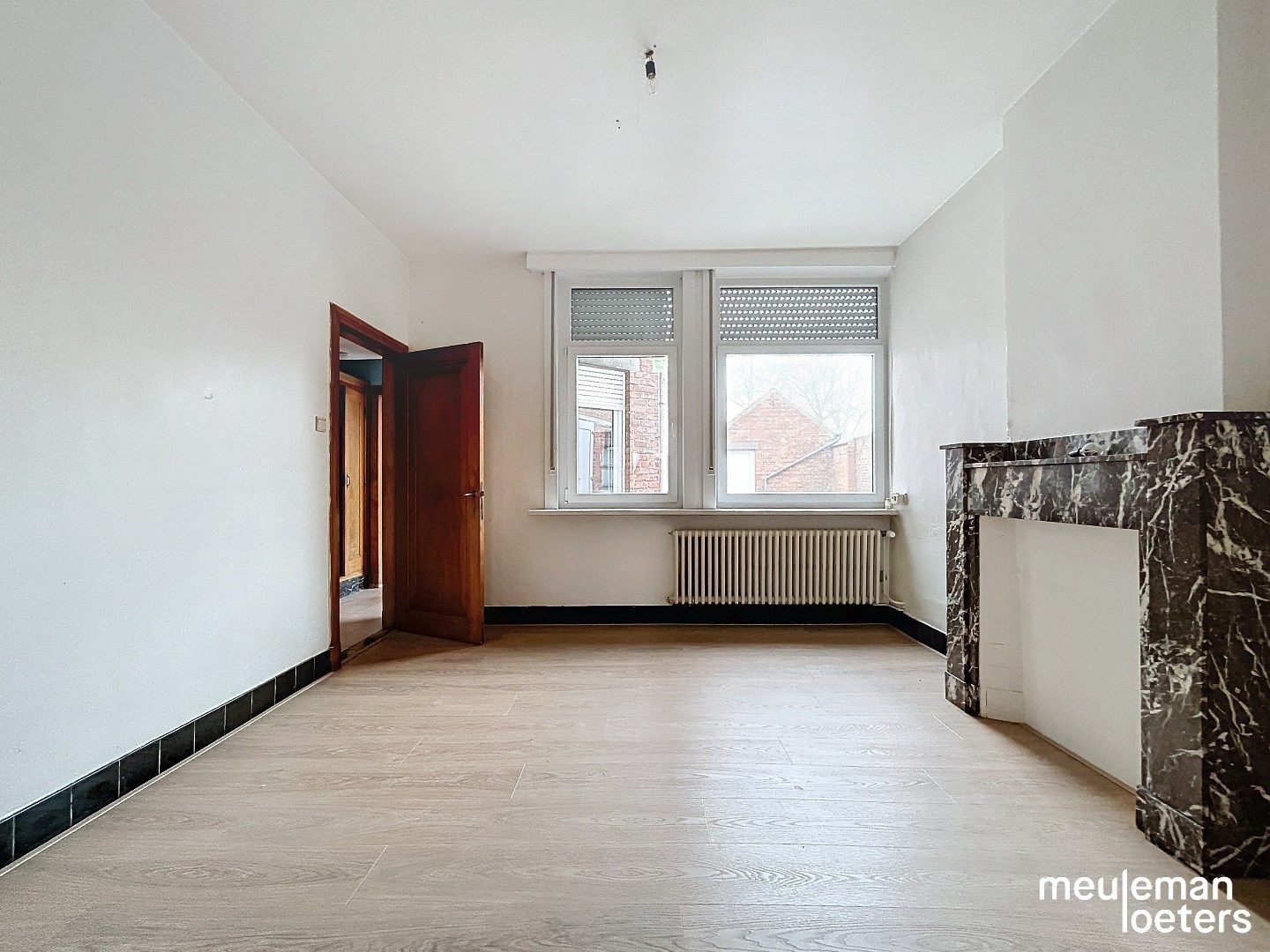 Karaktervolle ruime rijwoning met garage en tuin foto 6