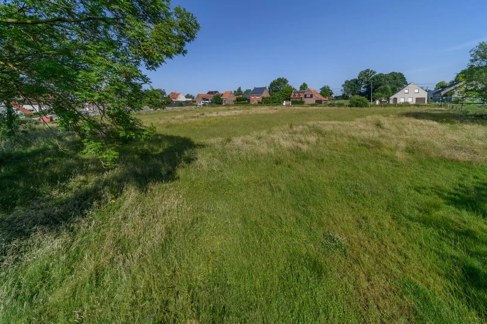 Bouwgrond - halfopen bebouwing te Sint-Lievens-Houtem foto 3