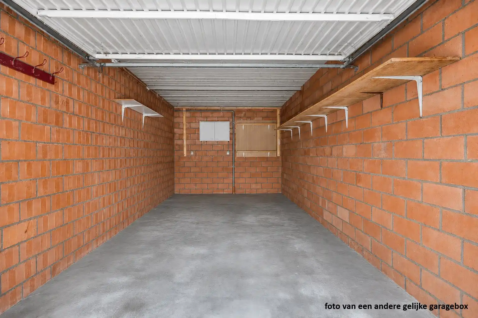 Appartement met 2 SLPKS en garage op gunstige locatie in het centrum. foto 19