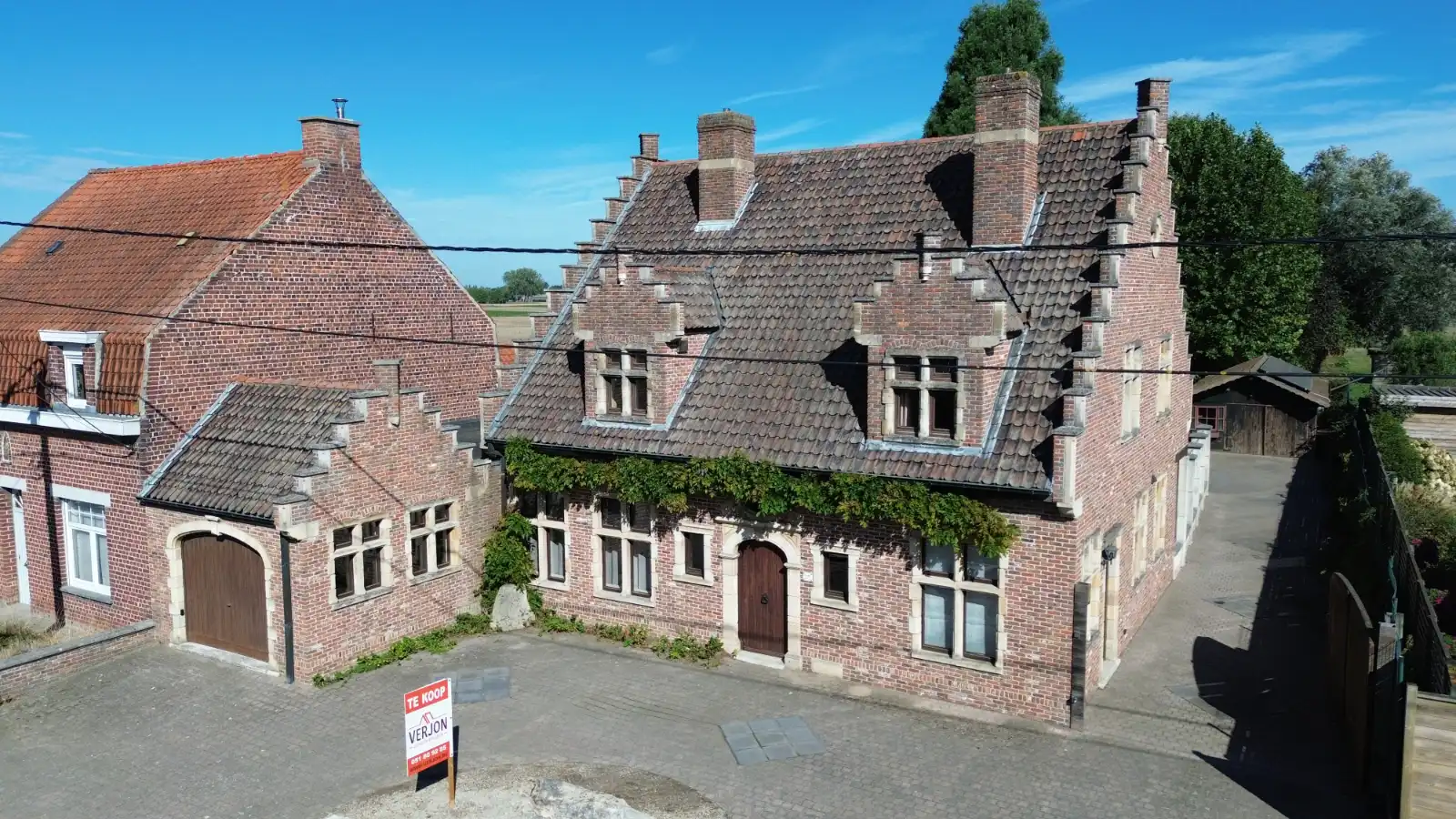 Karaktervolle halfopen woning op een riant perceel van 2.144 m² in Sint-Eloois Winkel! foto 20