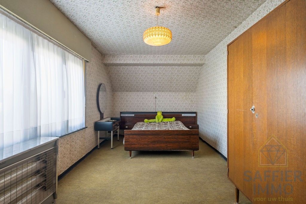 Ruime woning met loods op een perceel van 2200m². foto 17