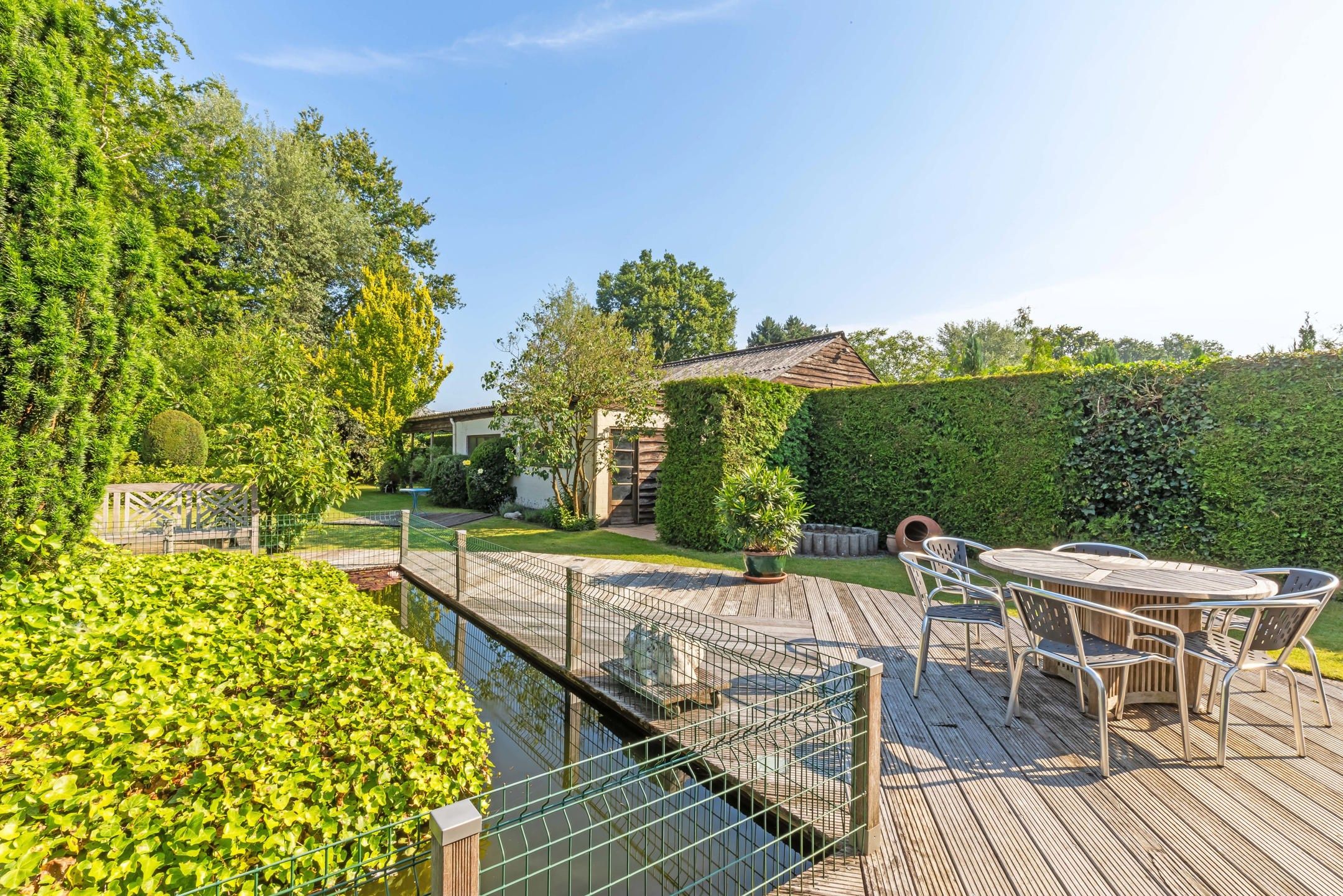 Charmante ruime woning (6 SLPK) met mooie tuin + vijver  foto 23