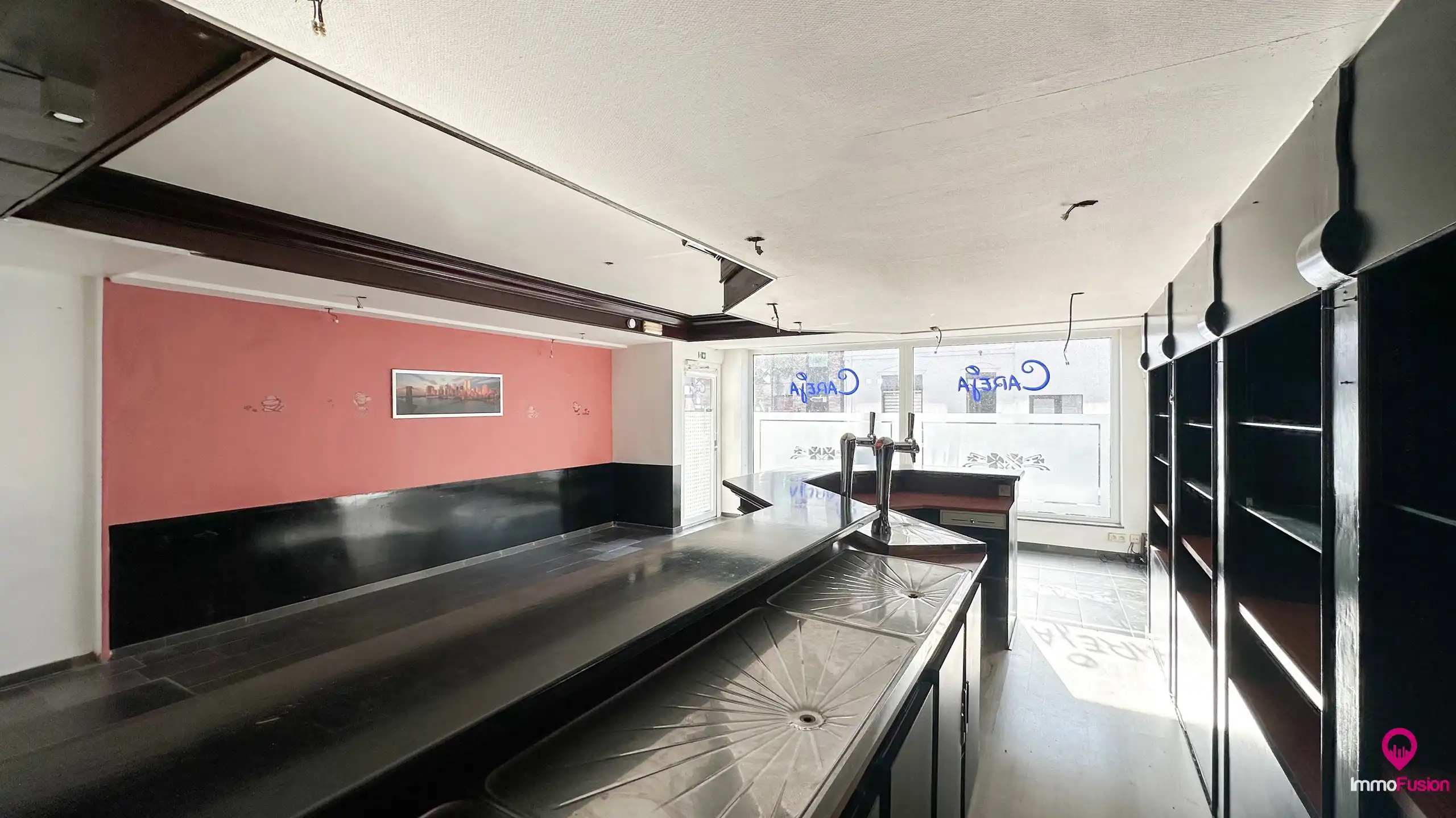 Ruim handelspand met garage in het centrum van Beringen! foto 8