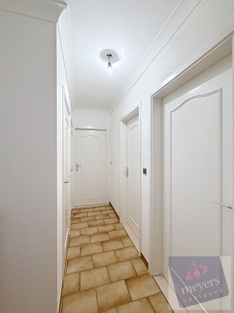 Instapklaar appartement met balkon en garage op toplocatie in Kuringen foto 13