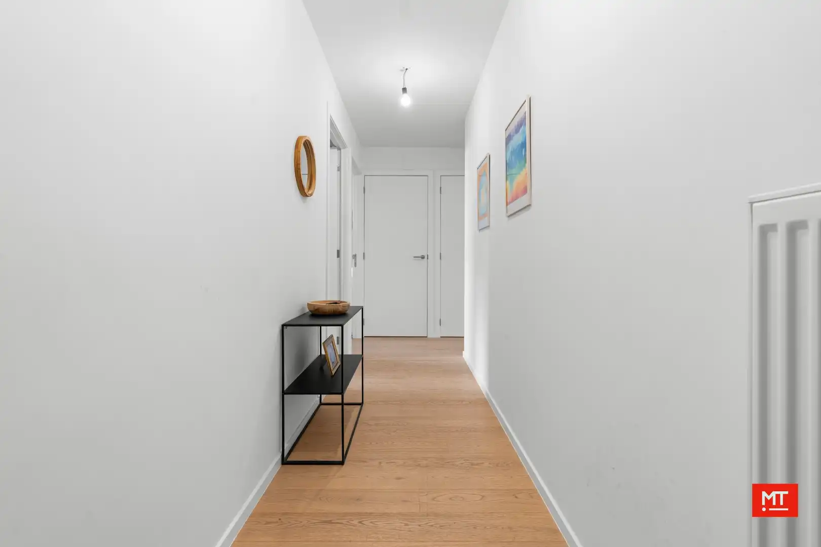 Recent appartement met 2 slaapkamers en ondergrondse parkeerplaats te koop in hartje Ieper foto 10