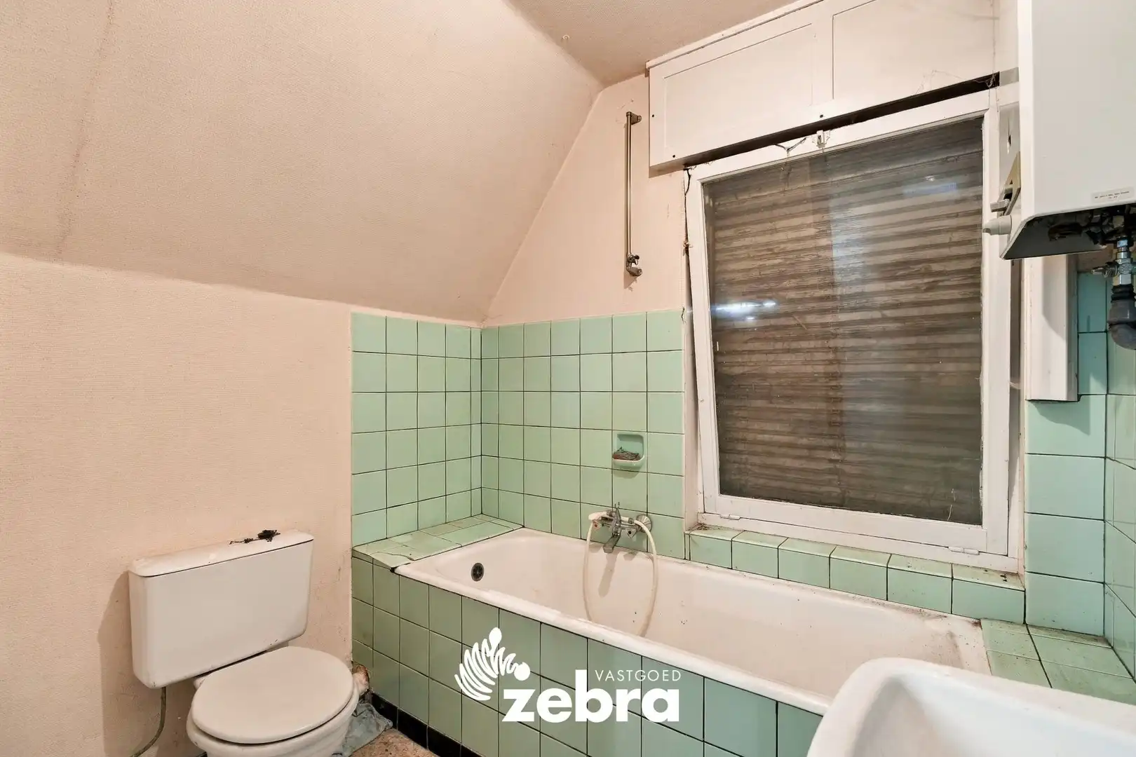 Te renoveren woning in Rumbeke! foto 14