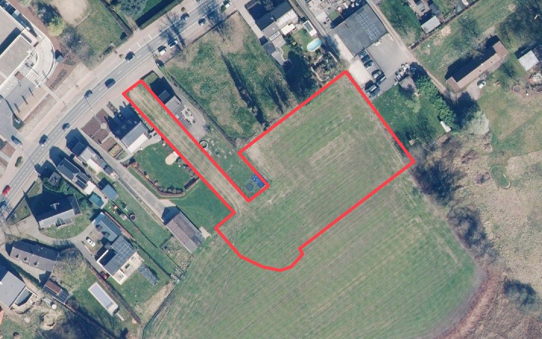 Uitzonderlijke bouwgrond met een totale oppervlakte van 5.684 m² te Emblem! foto {{pictureIndex}}