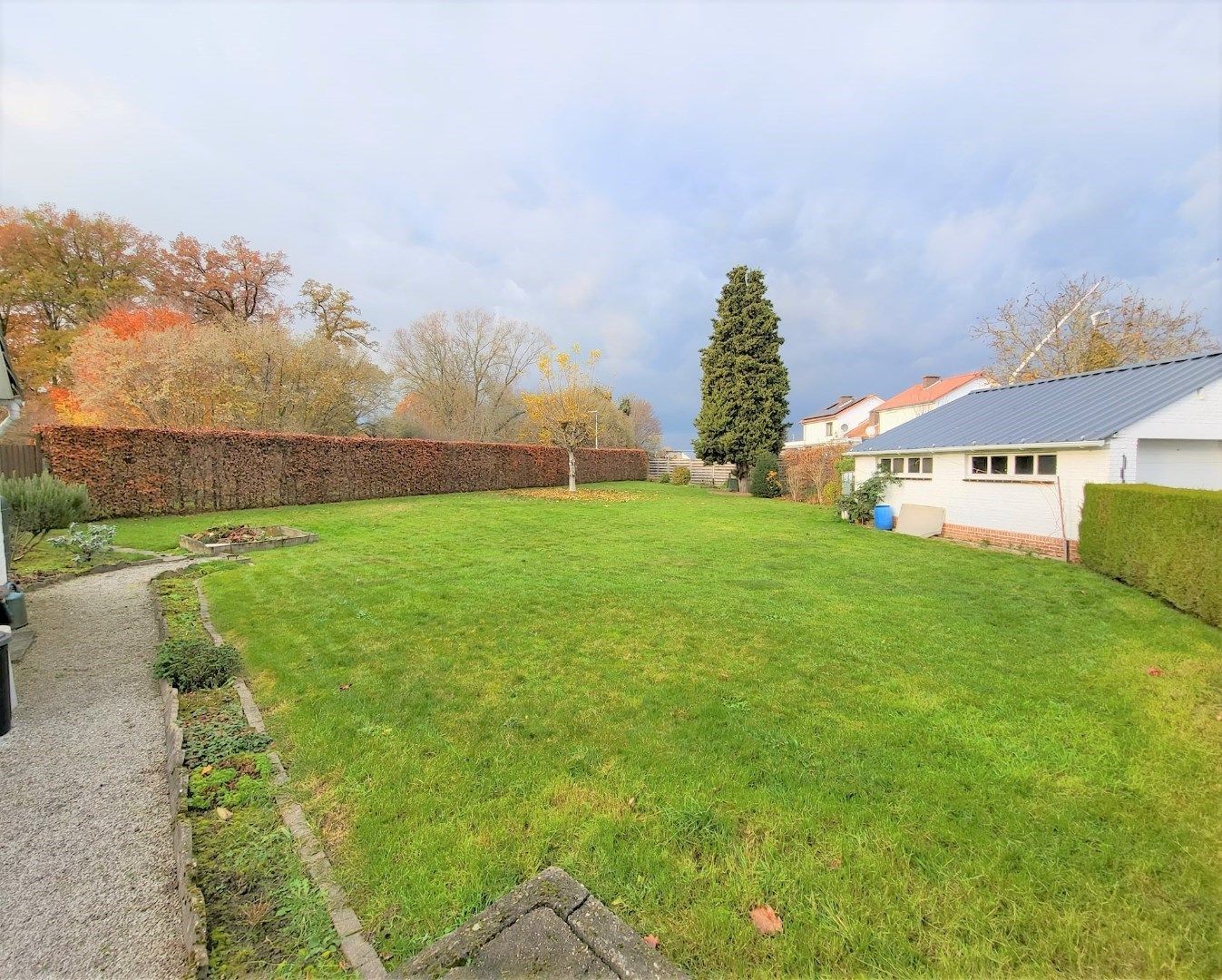 Halfopen bebouwing met garage en schitterende tuin. foto 20