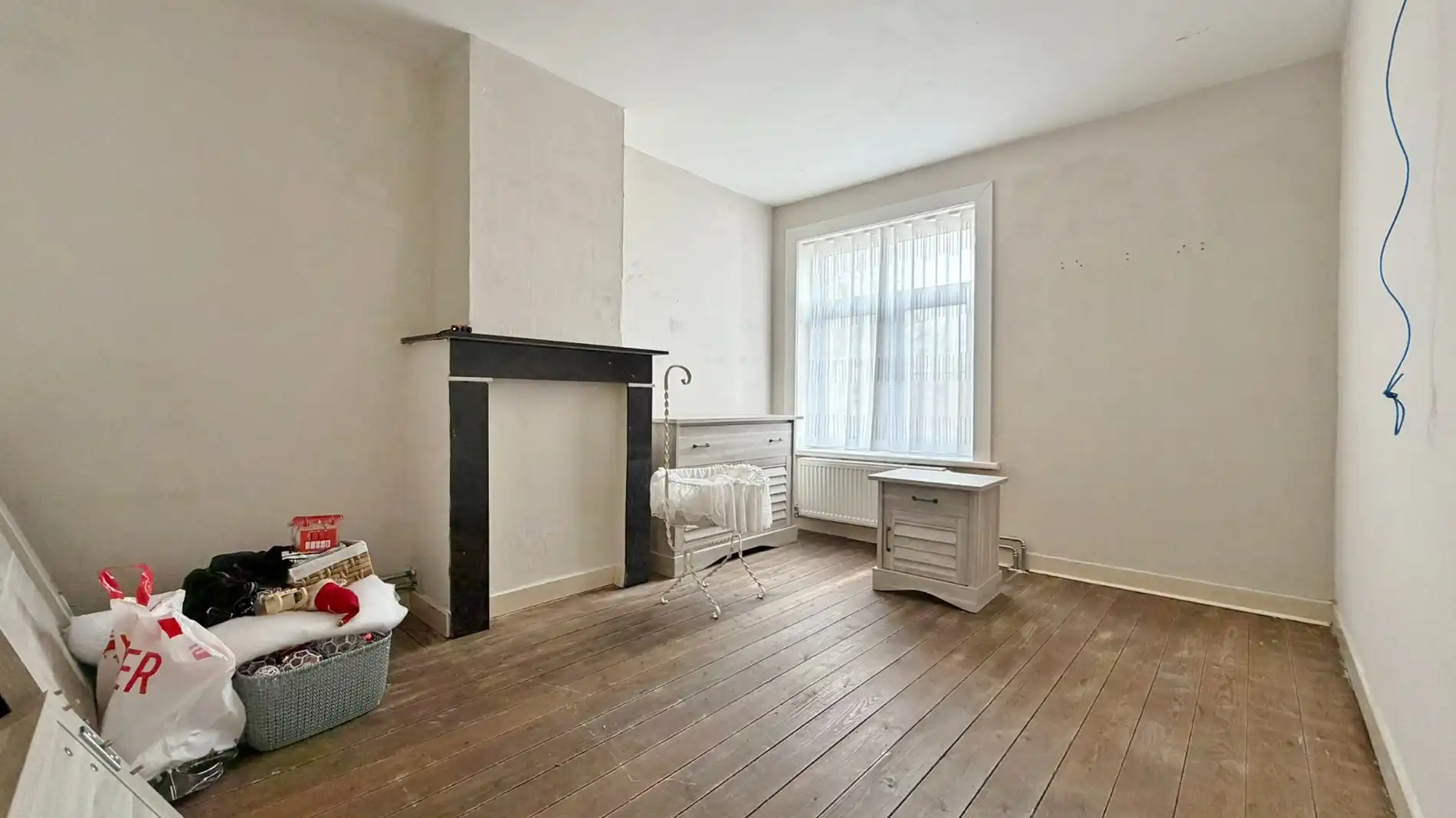 Charmante rijwoning met zonnige tuin in het rustige Woesten foto 11