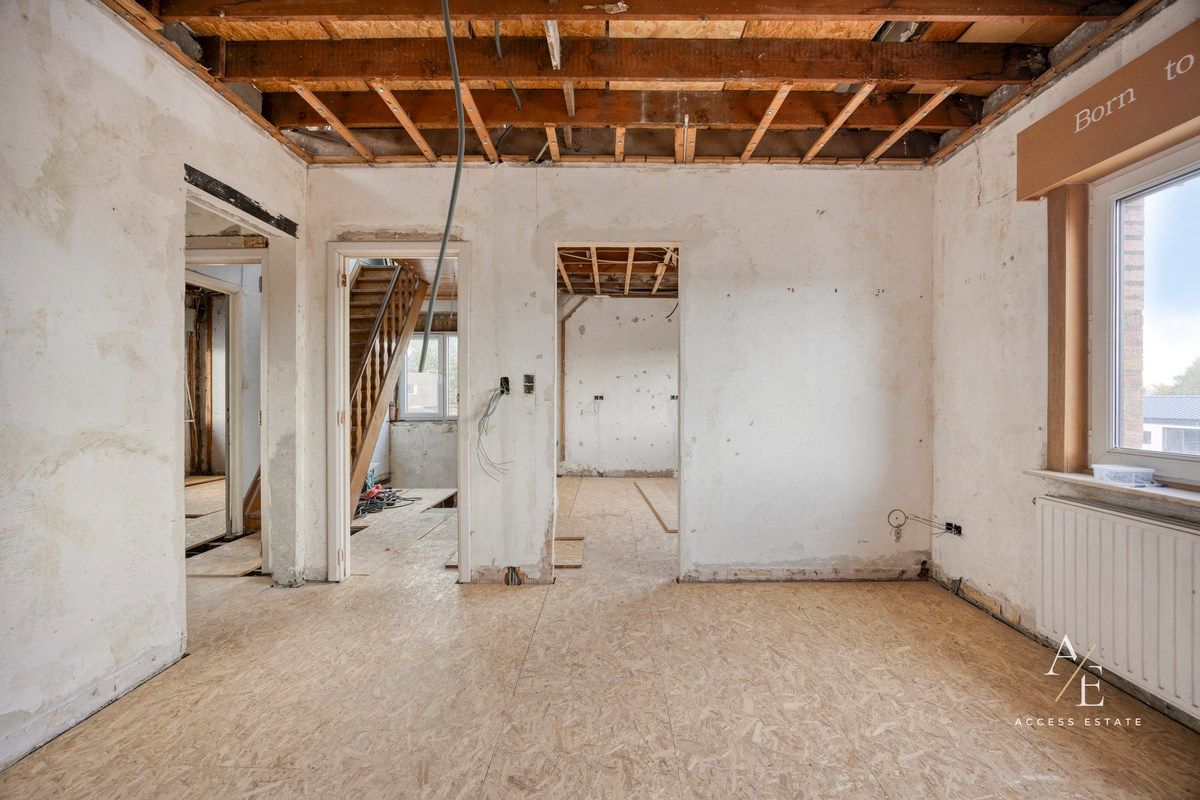 Ruime halfopen woning met potentieel in rustige straat te Melle foto 12