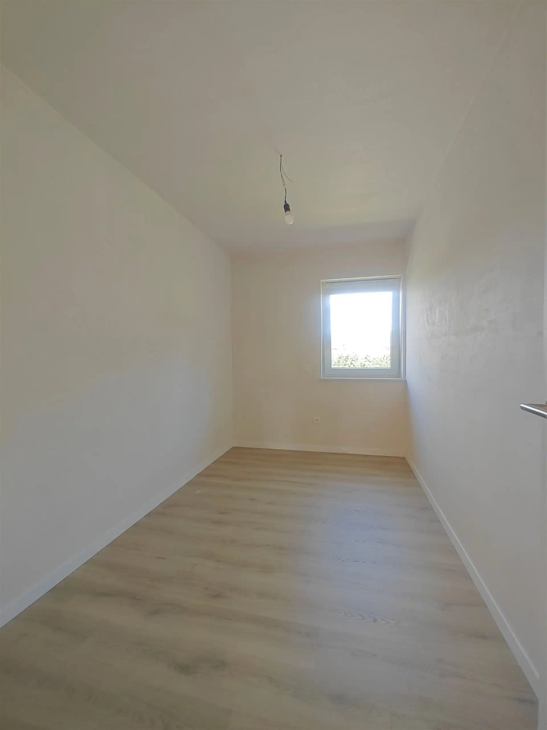 Instapklare nieuwbouwwoning met 3 slaapkamers in een rustige, kindvriendelijke buurt van Maasmechelen.  foto 17