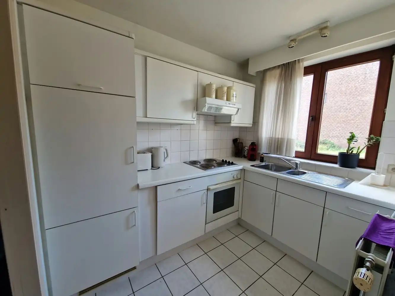 Ruim gelijkvloers appartement met 2 slaapkamers te huur in Lanaken foto 6
