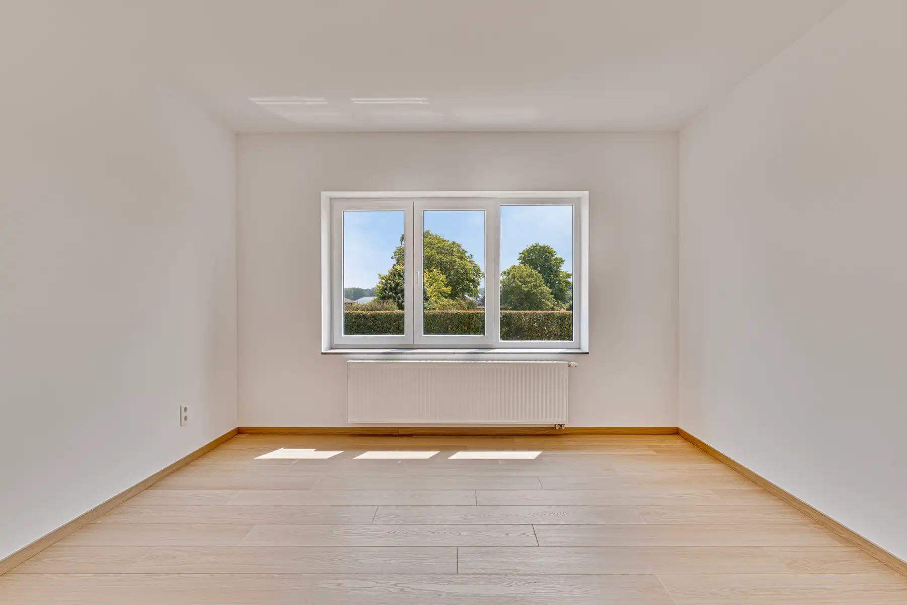 Duplex appartement met 4 slpk en 2 badkamers, tuin en garage foto 11