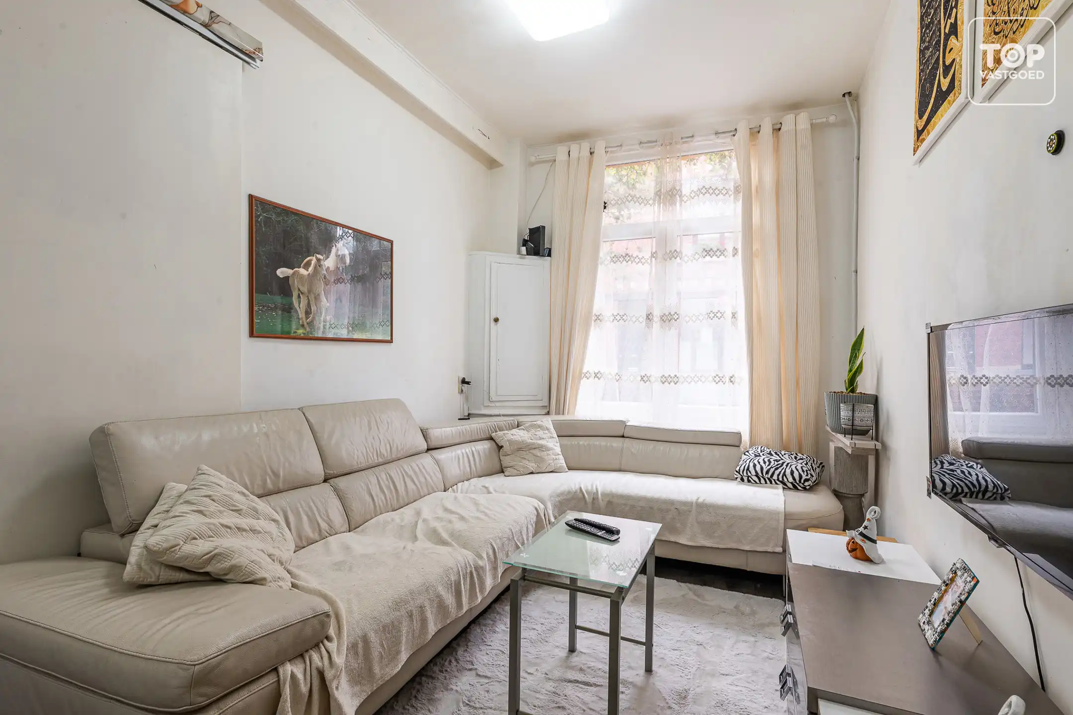 Centraal gelegen, gerenoveerde ééngezinswoning met 3 slaapkamers.  foto 3