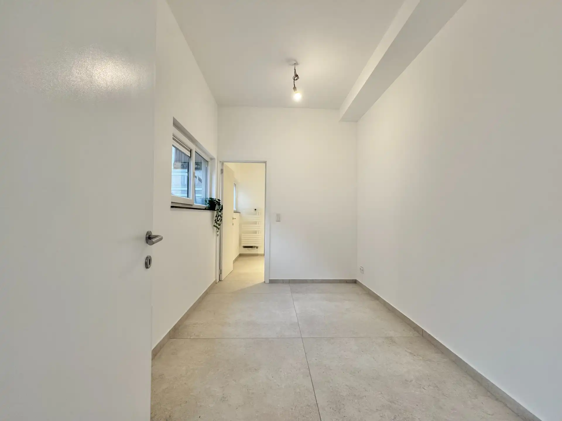 GELIJKVLOERS APPARTEMENT| 2 KAMERS | 1 PARKEERPLAATS | TERRAS foto 22