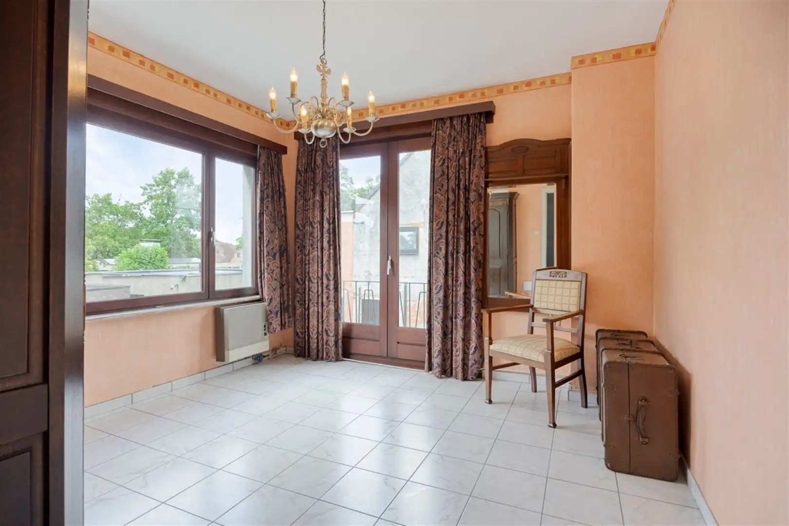 Rustig gelegen, op te frissen halfopen bebouwing met 3 slaapkamers op een perceel van 672 m². foto 11