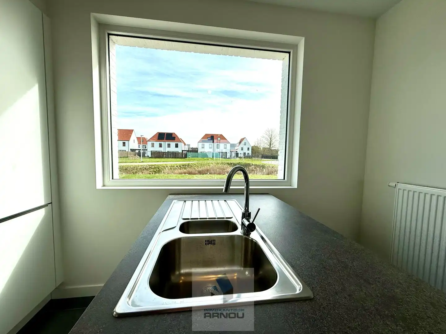 Nieuwbouwwoning met 3 slaapkamers, tuin en carport foto 12