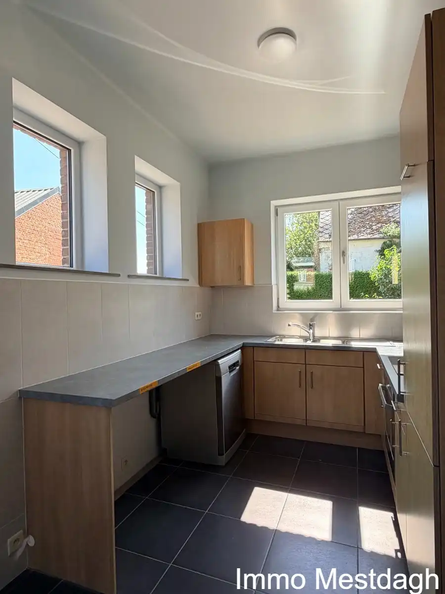 Prachtig gerenoveerd gelijkvloers appartement met terras en tuin in centrum Rummen foto 11