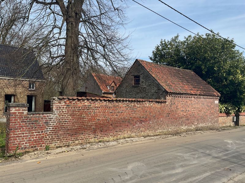 Hoevewoning met bijgebouwen met heel wat potentieel foto 3