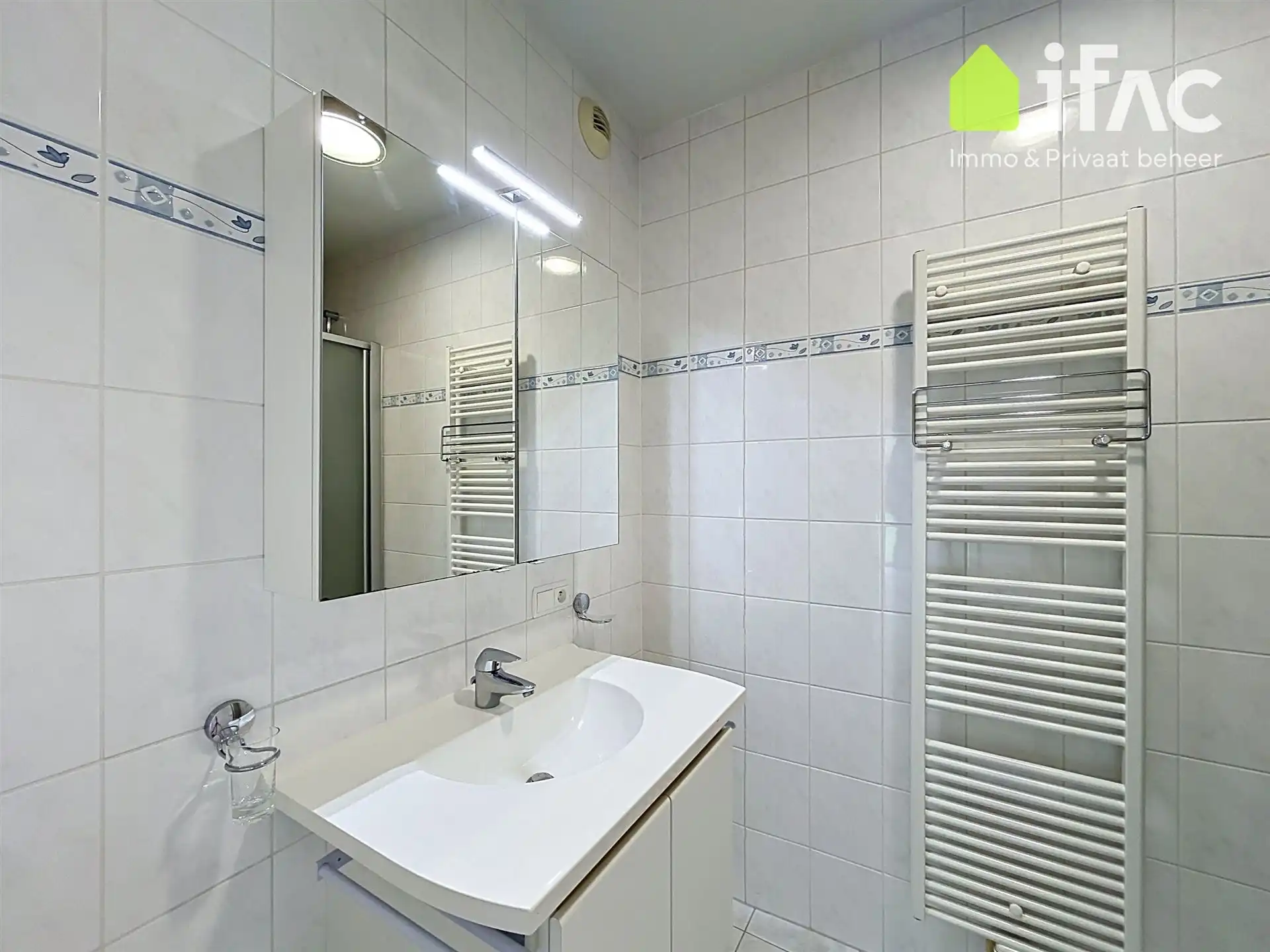Exclusief gelijkvloers appartement met 2sk en privé tuin foto 16