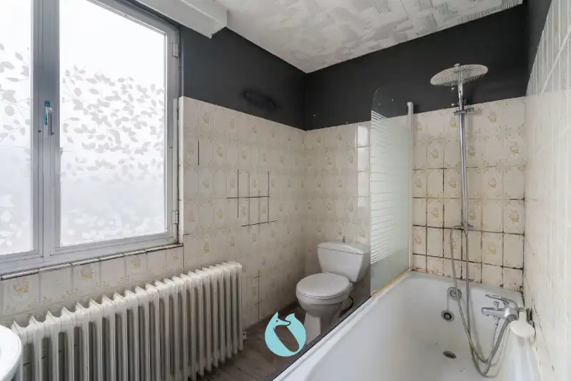 Kleinschalig gebouw met 2 appartementen en 2 garages foto 17